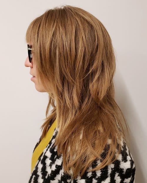 70's Inspired Choppy Shaggy Cut with Feathered Layers