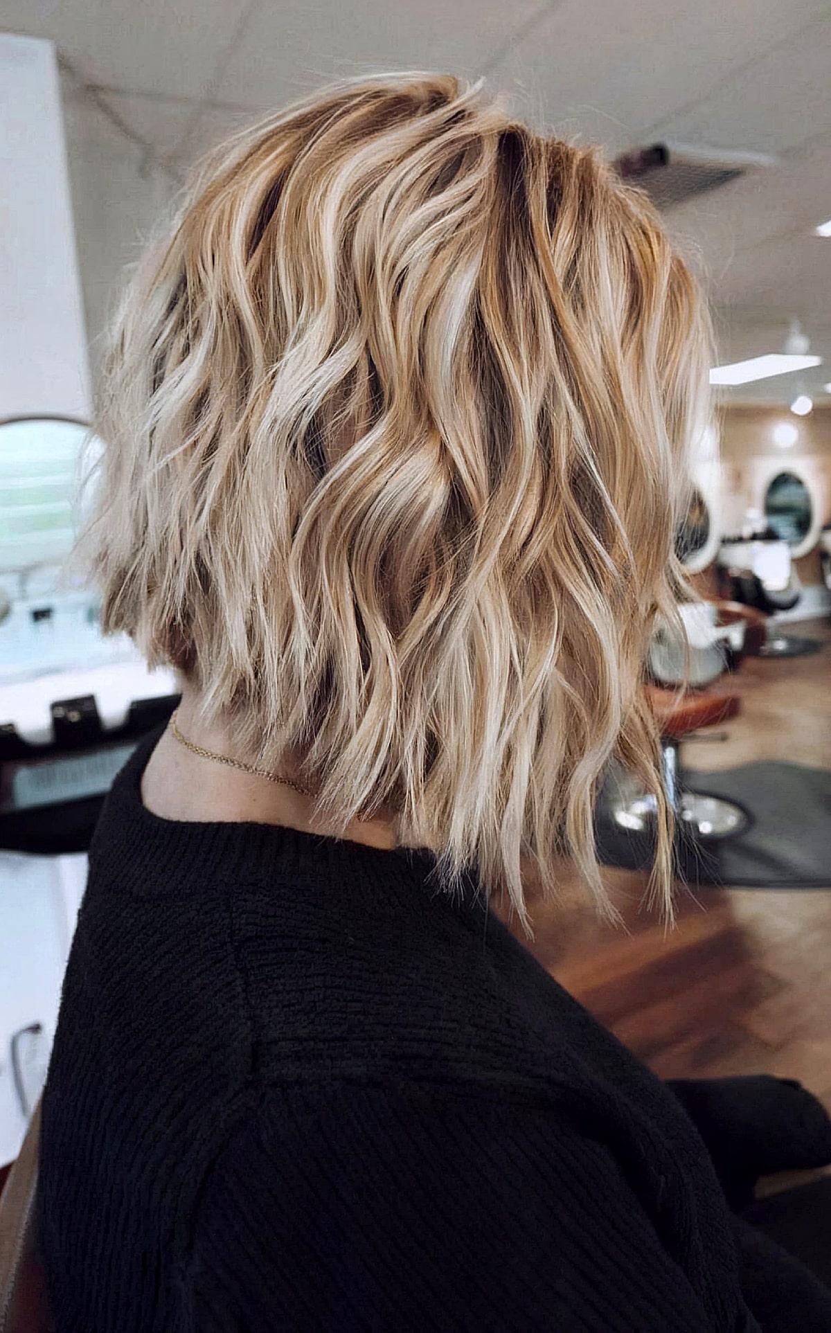 Angled Wavy Blonde Bob with Jagged Ends