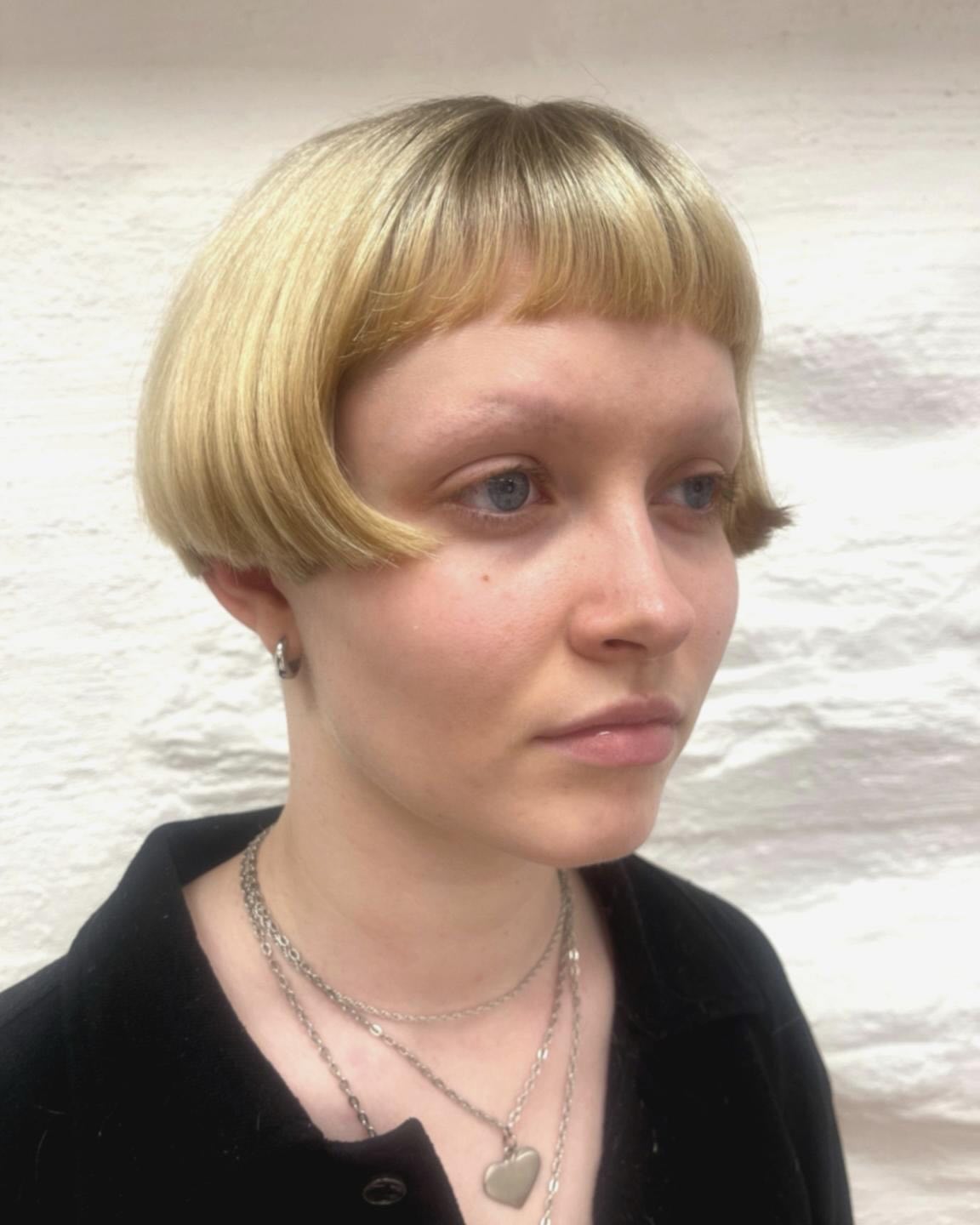 Chic Bleached Bob with Curved Bangs