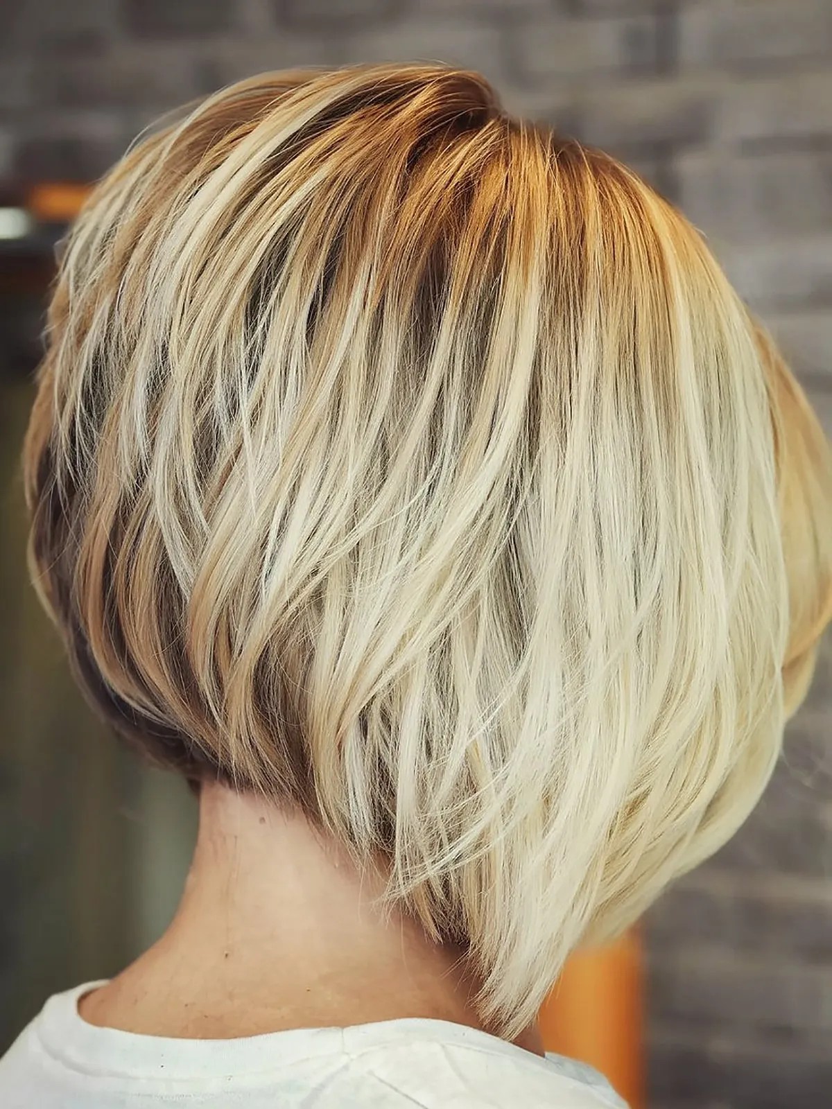 Messy inverted bob with long layers