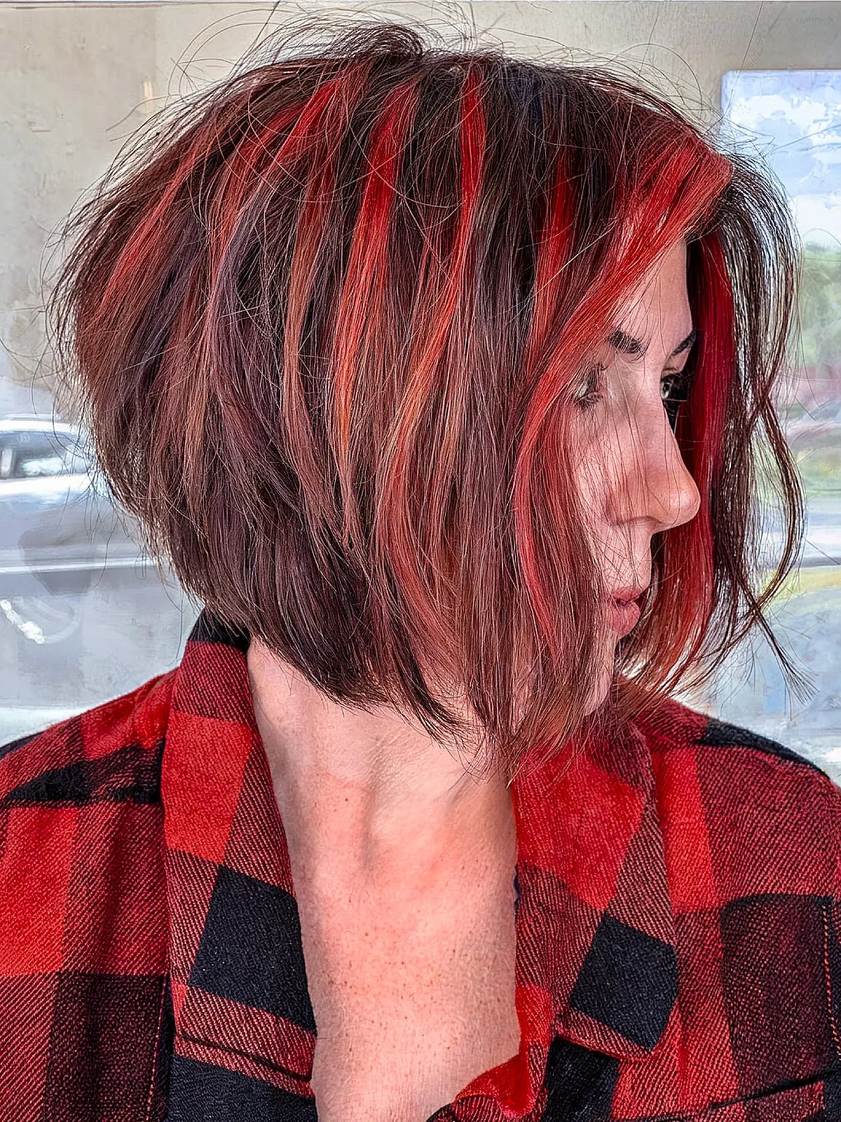 Messy Short Graduated Stacked Bob with Red Chunky Highlights