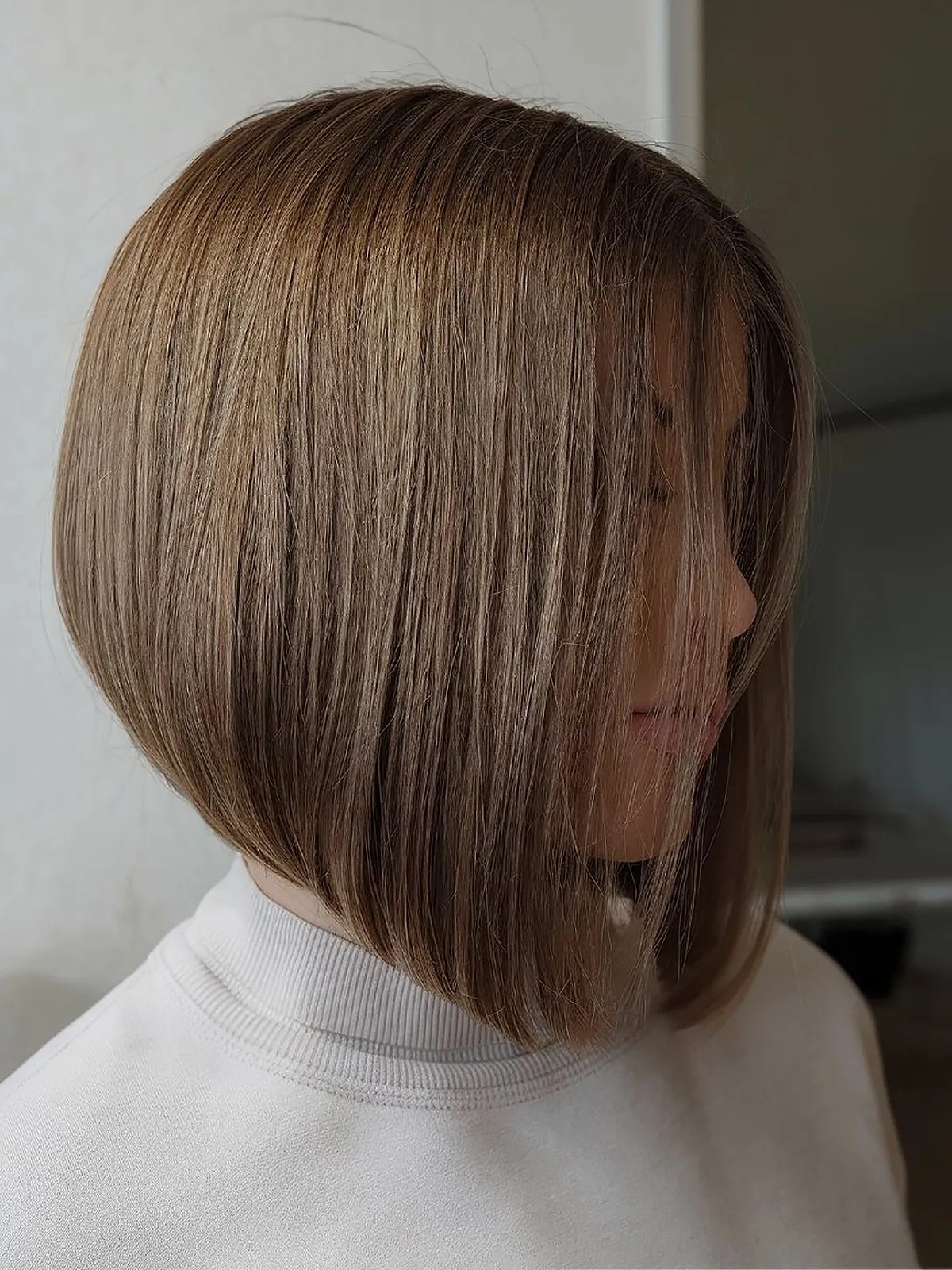 slightly inverted bob cut