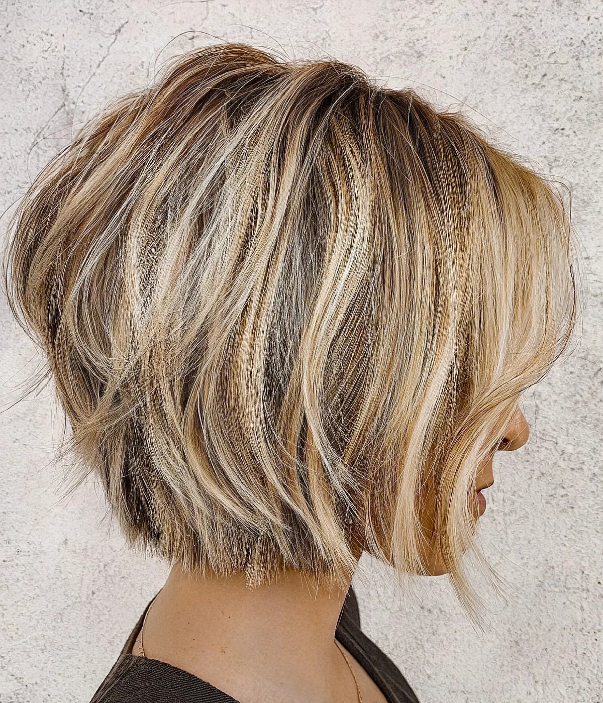 Stacked Bobbed Short Hair with Razored Ends and Soft Waves
