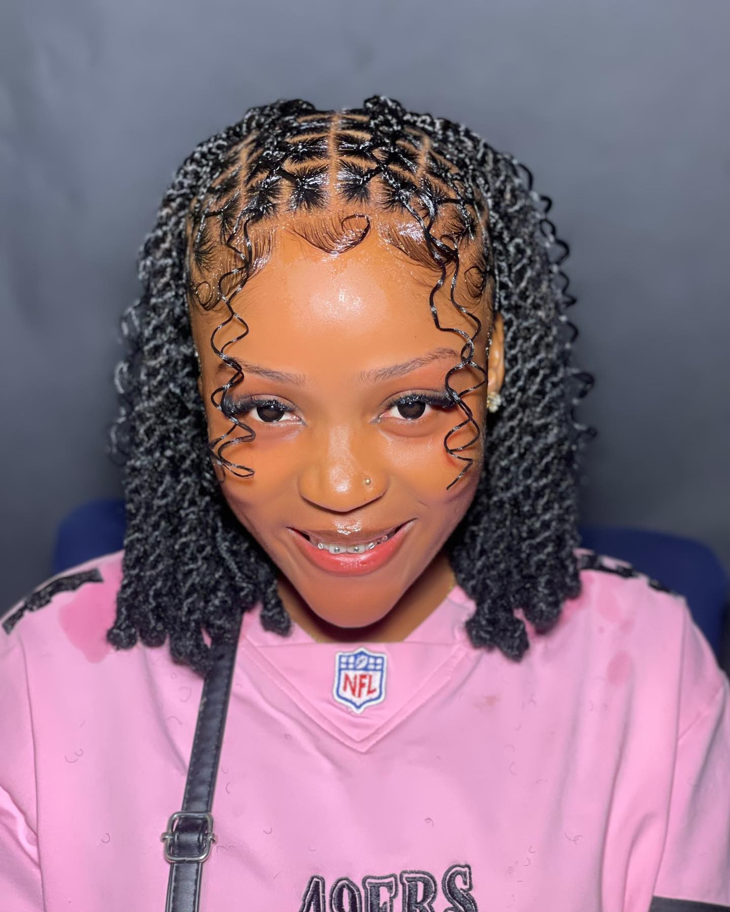 stylish curly box braids with defined curls