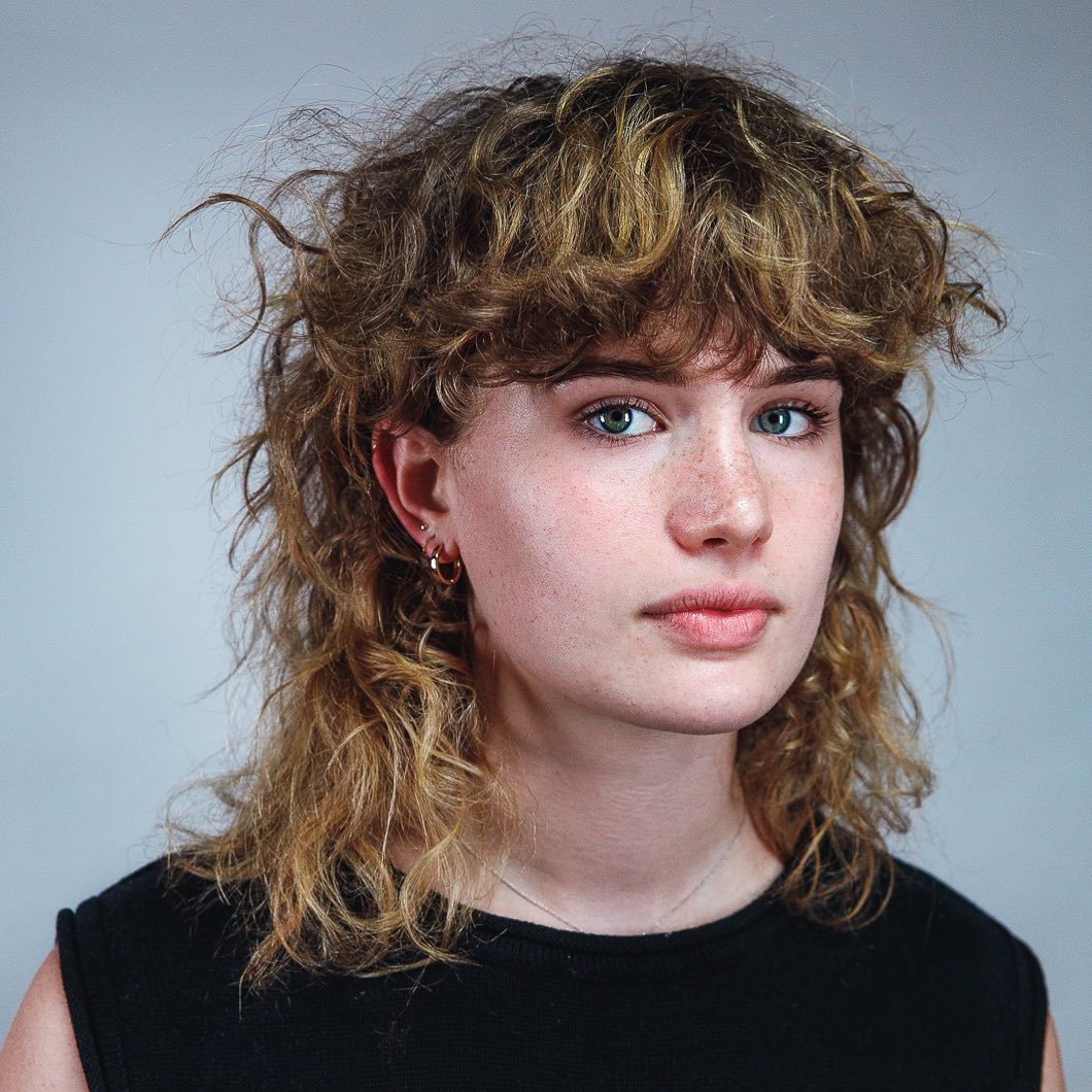 textured curly shag with bangs